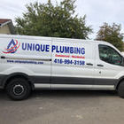 Unique Plumbing's logo