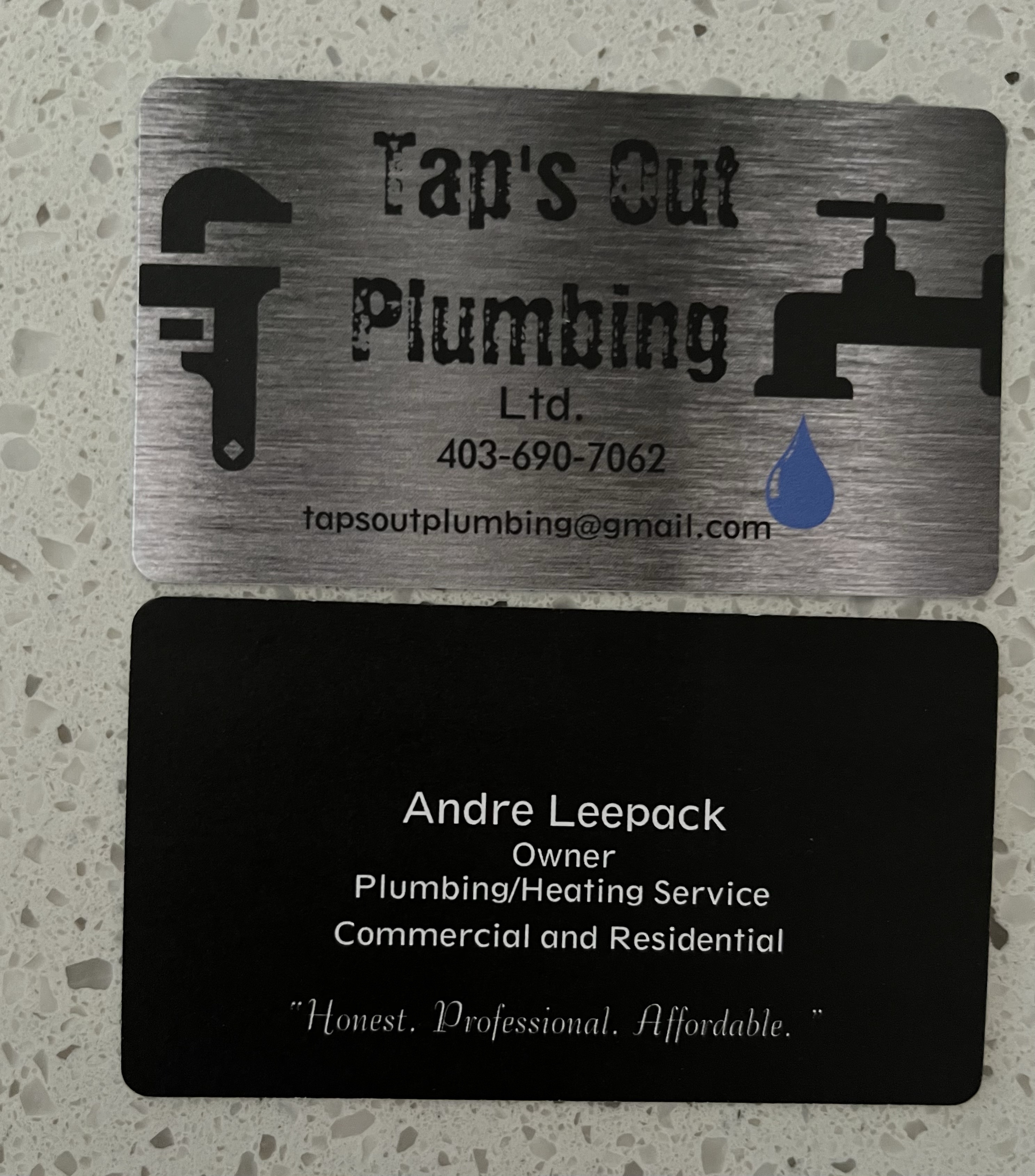 Tap’s Out Plumbing Ltd.'s logo